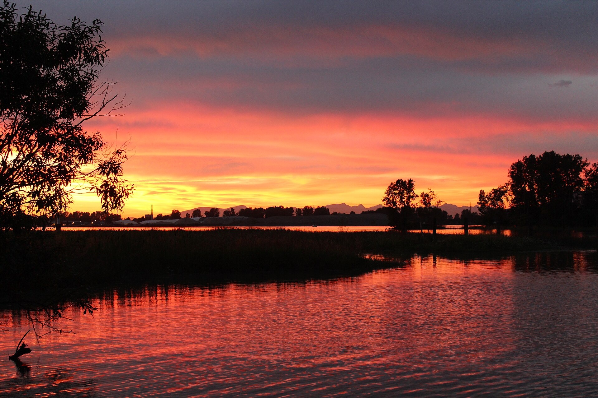 Sunset over the Fraser River from the Ferry Road pier in Ladner, Delta